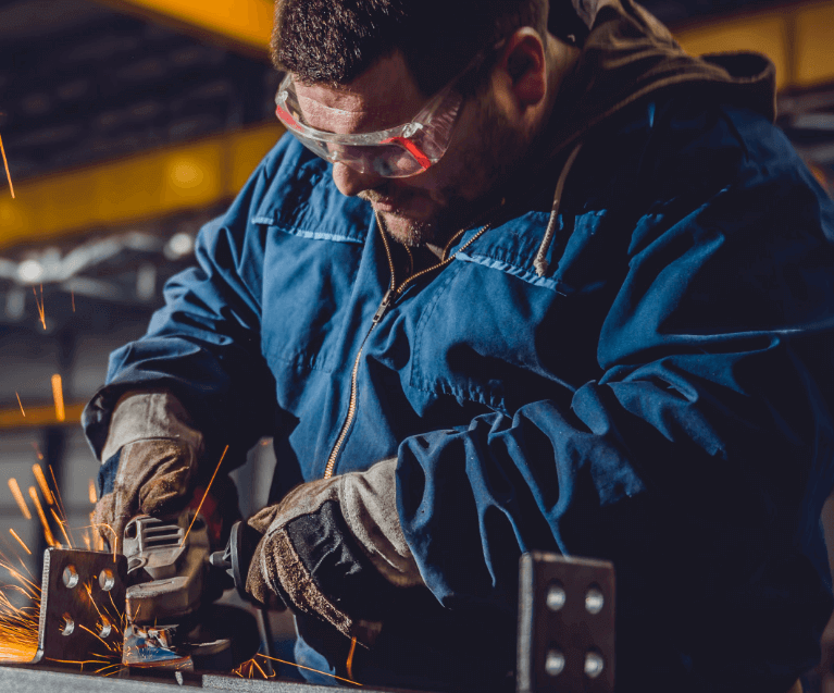 construction-working-on-grinder