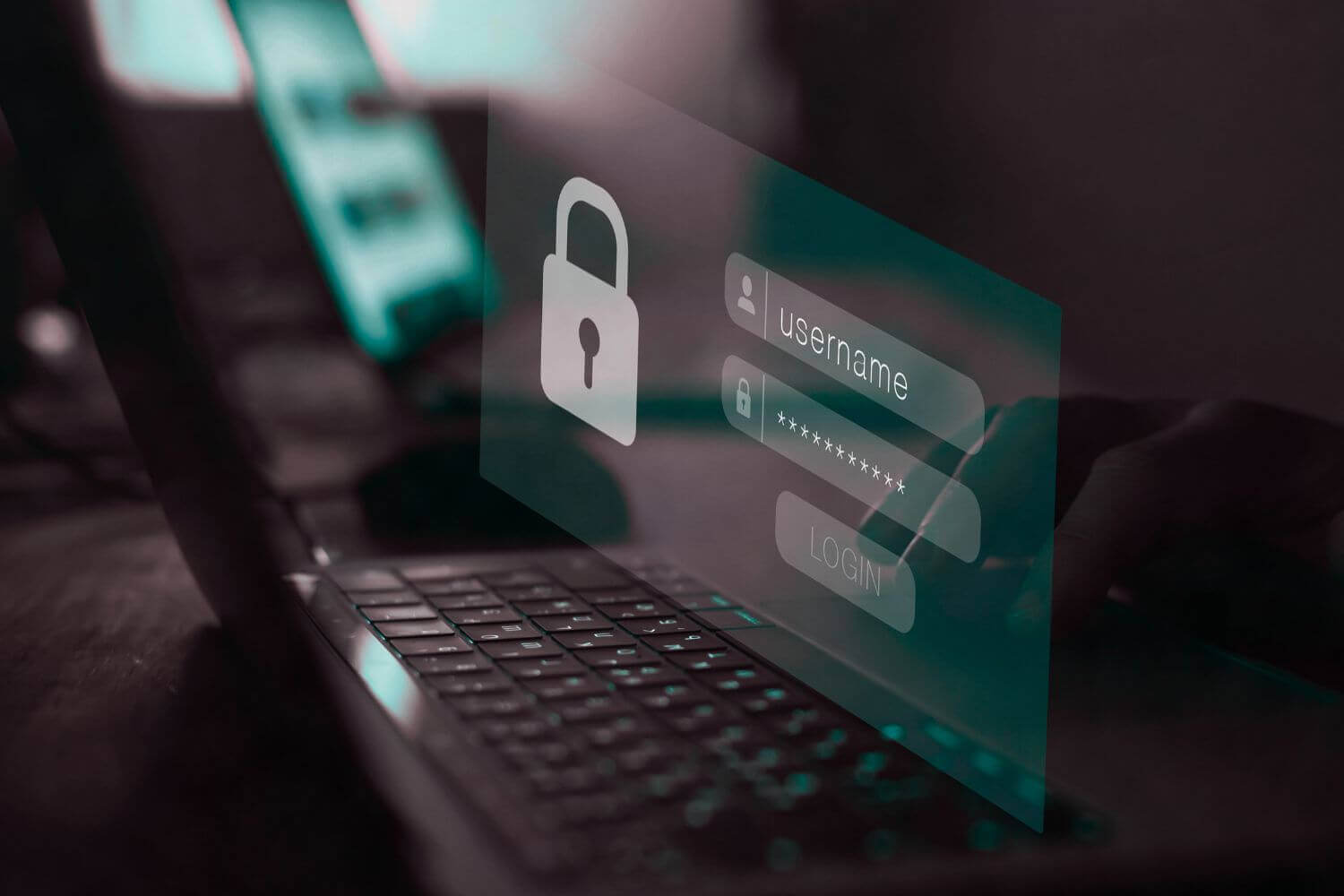 Image of laptop and login overlay, representing article on cyber security best practices for small businesses and freelancers.